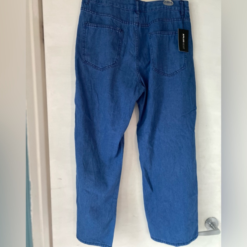 Stylish Blue Denim Pants with Unique Cutouts - Never Worn - Picture 4 of 4